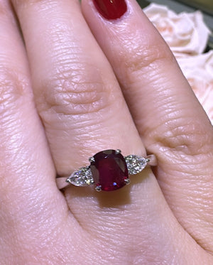 1.60ct tw Three Stone Ruby Cushion Center with Side Diamonds Ring