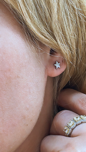 Ladies 0.05ct tw Diamond Star Stud Earrings