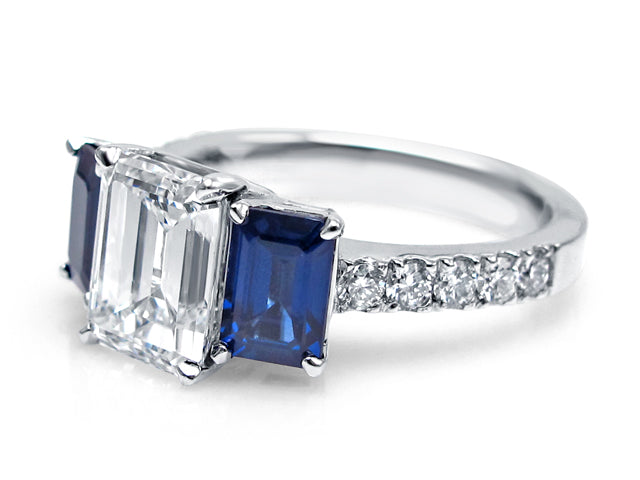 Emerald cut diamond with sapphire side stones Clearance