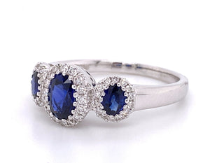 Blue Sapphire Three Stone and Diamond Halo Ring