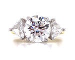 3.70ct Round Brilliant Cut Center with 1.60ct t.w. 2 Trillion Cut Side Diamond Engagement Ring