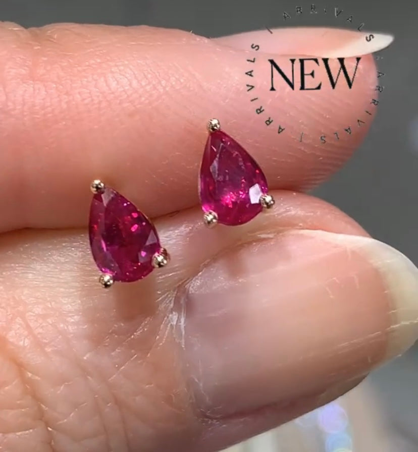 0.86ct tw Ladies Pear Shape Ruby Stud Earrings