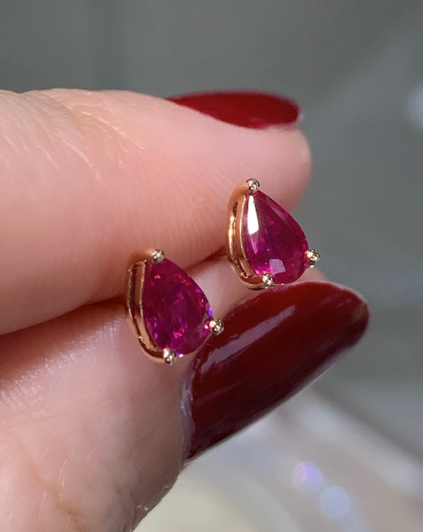 0.86ct tw Ladies Pear Shape Ruby Stud Earrings