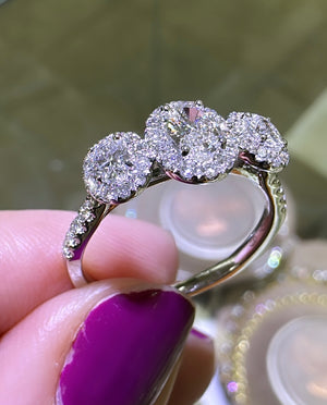 Oval Three Stone With Halo 1.62ct t.w. Ring