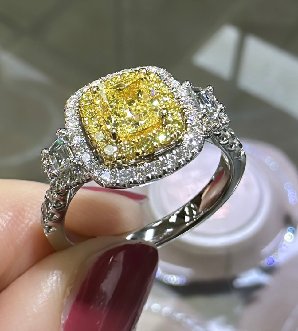 Canary Fancy Yellow Cushion Cut 1.84ctw, 2 Trapezoid 0.59ctw Halo Ring
