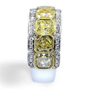 Breathtaking Totaling 5.39 ctw Radiant Cut Fancy Yellow Diamond Ring - HANIKEN JEWELERS NEW-YORK